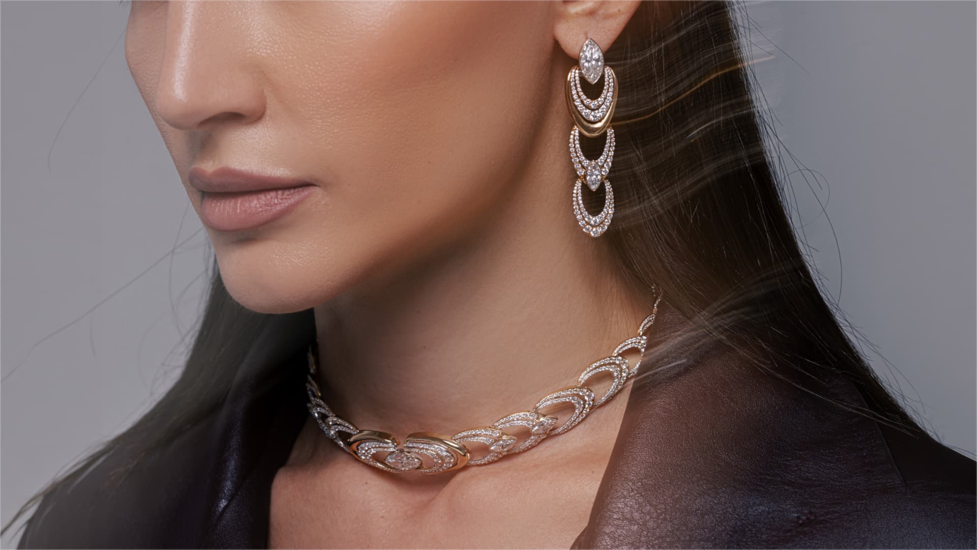 Model wearing ZORÁE diamond earrings and necklace